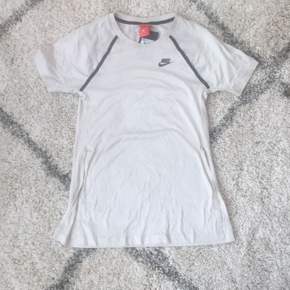 Nike tech pack top. Has splits on the side.